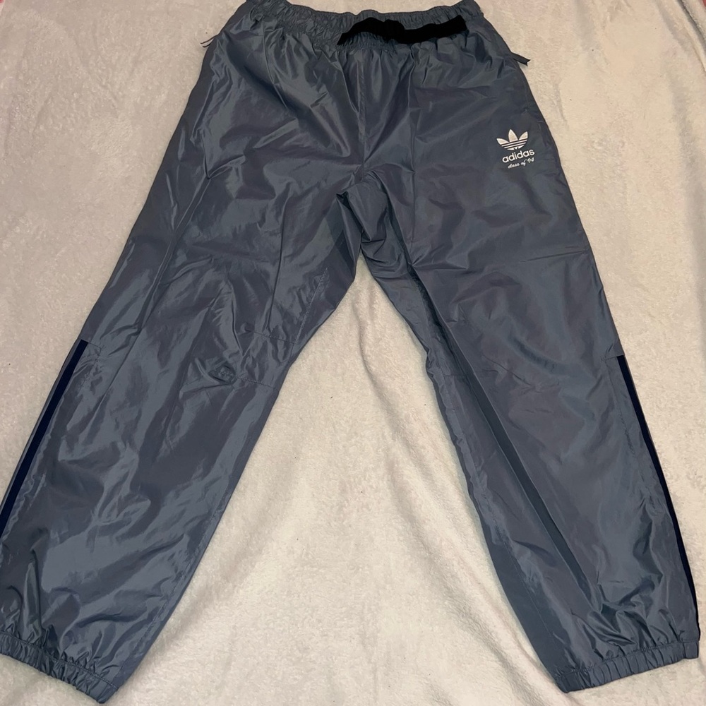 Vintage Adidas Originals blue/greyish tracksuit bottoms size medium